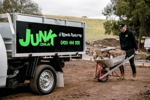 Junk dude loading concrete to a Junk truck