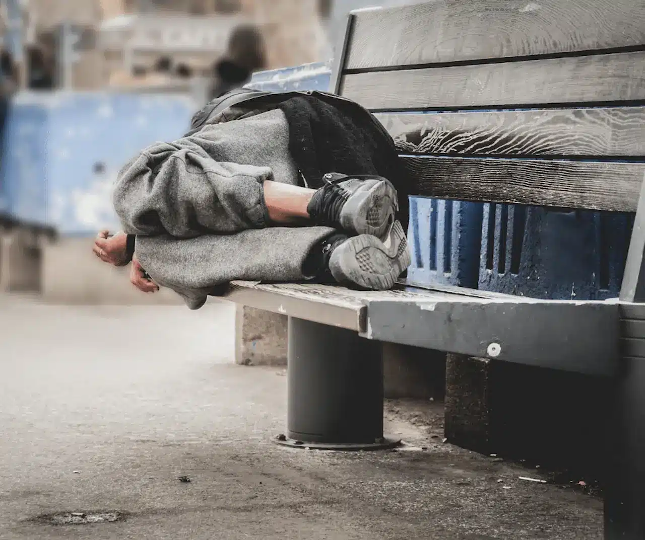 Homeless Man Sleeping on the Bench 