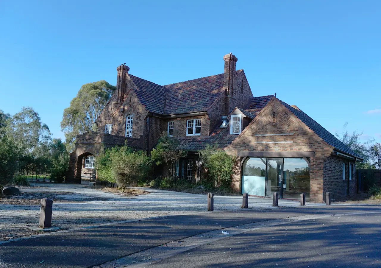 Manor House at Templestowe Lower Vic Australia over Blue Sky